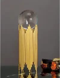 crystal ball with gold iron stand