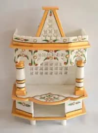handcrafted brass or marble temple for home