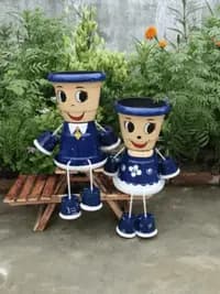 handcrafted terracotta pots with legs