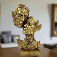 leaf couple faces statue showpiece